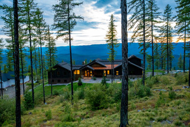 Rustic exterior home idea in Other