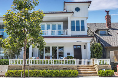 Inspiration for a coastal exterior home remodel in Orange County