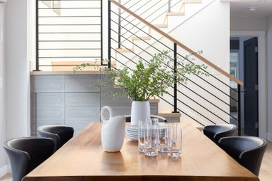 Inspiration for a large contemporary light wood floor and brown floor kitchen/dining room combo remodel in San Francisco
