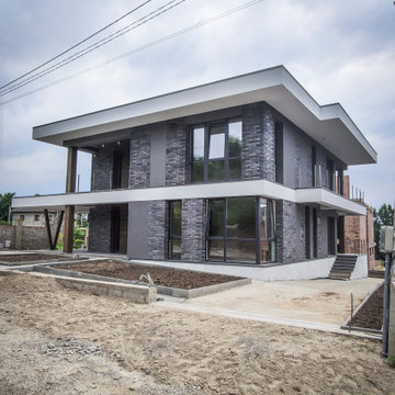 Modern two-story house with a terrace