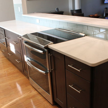 After: New opening into dining room with breakfast bar