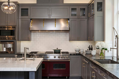 Transitional l-shaped kitchen photo in Chicago with an undermount sink, recessed-panel cabinets, gray cabinets, white backsplash, subway tile backsplash, colored appliances and an island