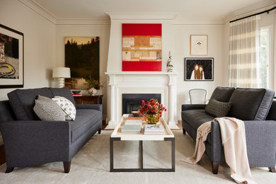 This is an example of a transitional living room in San Francisco with white walls.