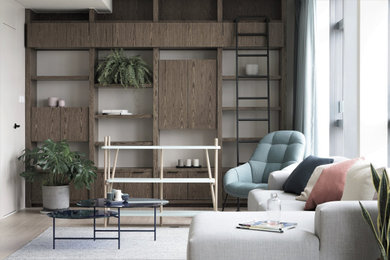 Example of a large minimalist living room design in Hong Kong