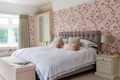 Design ideas for a classic guest and grey and pink bedroom in Hampshire with pink walls, carpet, no fireplace and beige floors.