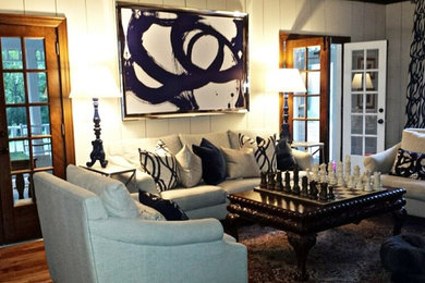 Inspiration for a mid-sized cottage enclosed dark wood floor and brown floor family room remodel in Other with white walls