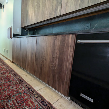 Contemporary Kitchen Remodel Done in a Walnut Slab Door