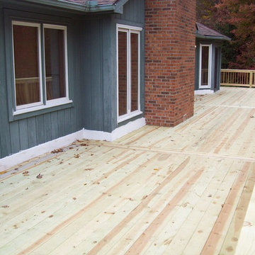 LARGE BASIC PRESSURE TREATED DECK WITH CEDAR INFILL AND BALUSTERS