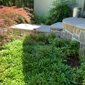 Walkway, retaining walls, plantings and stone stairs and front stoop
