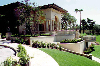 This is an example of a large mediterranean full sun backyard landscaping in San Luis Obispo.