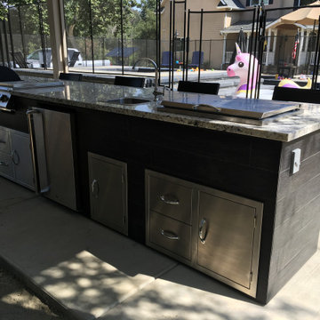 Spool with waterfall and Cover by Paradise Pools Visalia