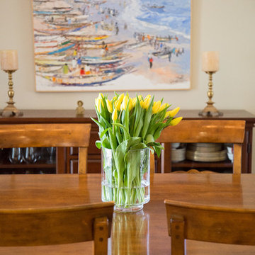 Eclectic Dining Room with Unique Area Rug