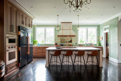 Inspiration for a large timeless l-shaped dark wood floor and brown floor eat-in kitchen remodel in Nashville with an undermount sink, beaded inset cabinets, medium tone wood cabinets, wood countertops, green backsplash, terra-cotta backsplash, colored appliances, an island and brown countertops