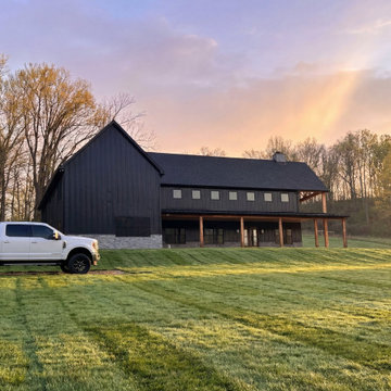 Modern Barn Style New Home Build with Wraparound Porch and Timber Beams