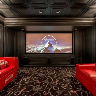 Inspiration for a mid-sized contemporary enclosed carpeted and black floor home theater remodel in Montreal with black walls and a projector screen