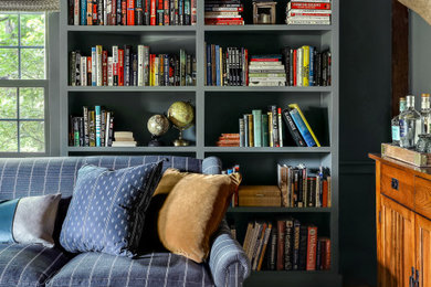 Mid-sized country wood ceiling living room library photo in Boston with gray walls and a media wall