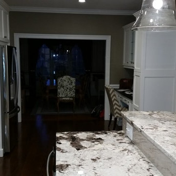 Knocked out part of a wall and opened up the dining room opening.