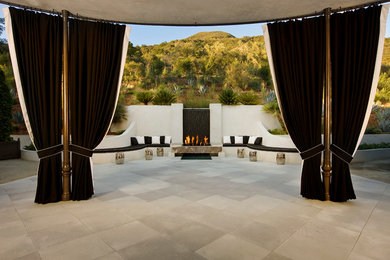 Transitional patio photo in Santa Barbara with a fire pit