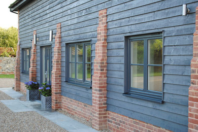 This is an example of a farmhouse house exterior in Other.