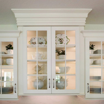 White Kitchen with Gray Quartz Countertops, Farmhouse Sink and Hardwood Floors