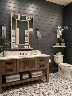 adding a tile wall behind the vanity and toilet