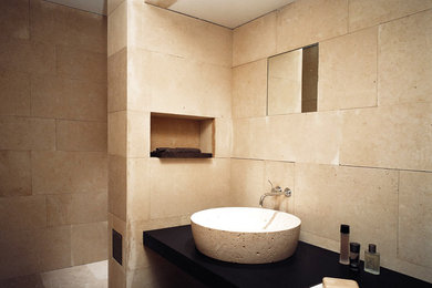 Bathroom - mid-sized mediterranean bathroom idea in Barcelona with beige walls and a vessel sink