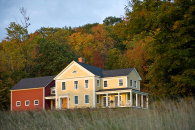 Country yellow two-story exterior home photo in Richmond