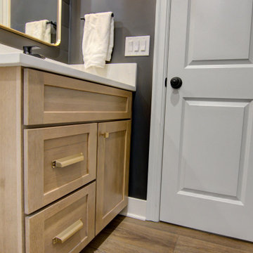 Warm & Inviting Basement Retreat with Kitchenette and Reading Nook