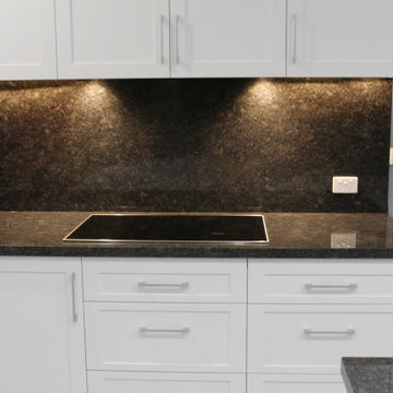 Stove with black benchtop - Shaker kitchen