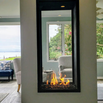 Tall Vertical Double Sided Gas Fireplace in Chesapeake Bay Residence