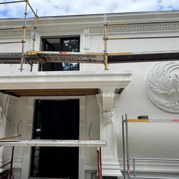 Work in progress: entrance details behind scaffolding.