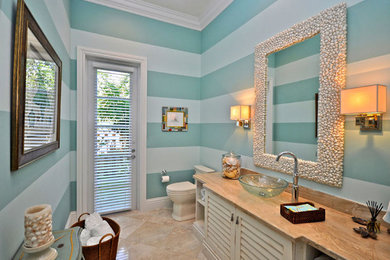 Example of an island style bathroom design in Miami
