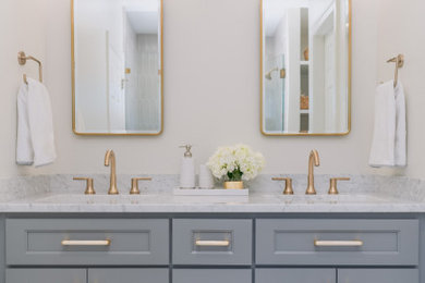 Example of a mid-sized trendy master porcelain tile, gray floor and double-sink bathroom design in Raleigh with shaker cabinets, gray cabinets, marble countertops, white countertops and a built-in vanity