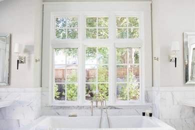 Freestanding bathtub - large contemporary master black and white tile and stone tile marble floor and white floor freestanding bathtub idea in San Francisco with gray walls, a pedestal sink, a one-piece toilet and solid surface countertops