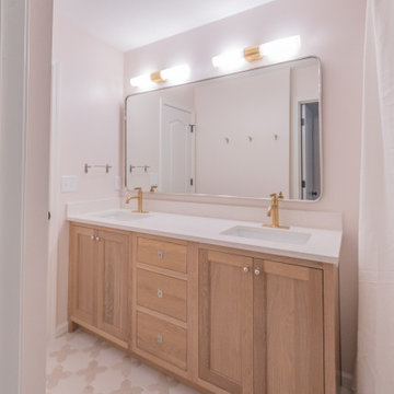 Playful Guest Bath Remodel with Fun Tile and Mixed Metals