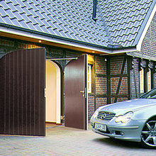 Side hinge garage doors for kubota