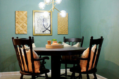 Example of a small eclectic light wood floor and beige floor kitchen/dining room combo design in Houston with blue walls
