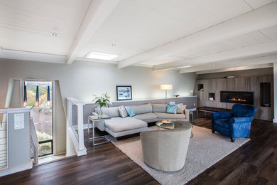 Living room - mid-sized contemporary formal and enclosed dark wood floor living room idea in San Francisco with white walls, a ribbon fireplace, a wood fireplace surround and no tv