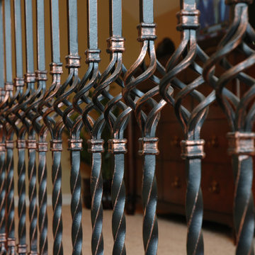 Wrought Iron Railing Adds Flair to Second Floor Bedroom