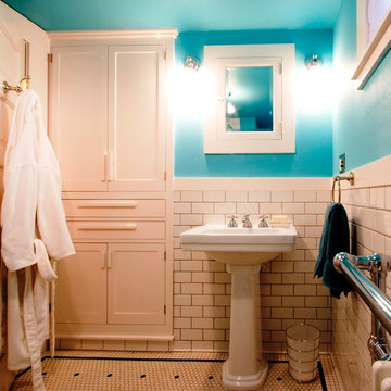 This bright bathroom anchors a complete basement remodel