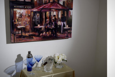 Inspiration for a small timeless wet bar remodel in Miami with raised-panel cabinets