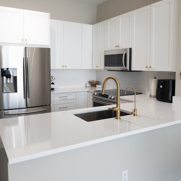 Contemporary Kitchen Remodel Done in a Painted White Shaker Door