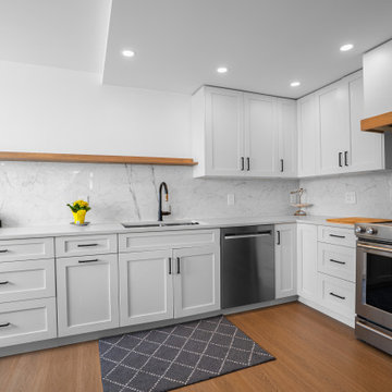 Hollyburn Condo Renovation – Custom Kitchen Cabinetry & Full-Height Slab Backspl