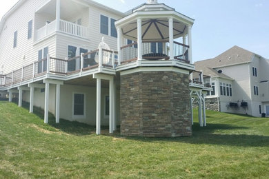 Large elegant backyard deck photo in Philadelphia