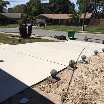 Stained Concrete: Driveway, Pool Deck, Patio, Sidewalks.