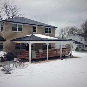 Metal Slate Roof, Insulated Vinyl, Infinity Windows, and Custom Rear Porch Porti