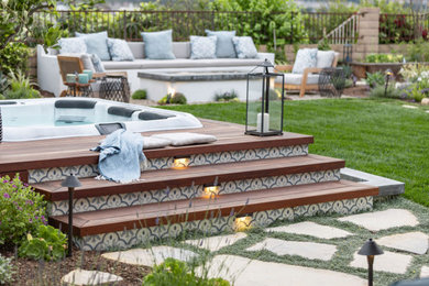 Inspiration for a mediterranean backyard landscaping in Orange County with a fire pit.