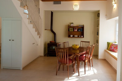 Dining room - eclectic dining room idea in Tel Aviv