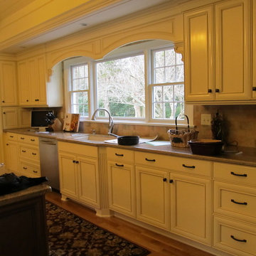 Upscale Softwhite Kitchen with Stained Wood Island