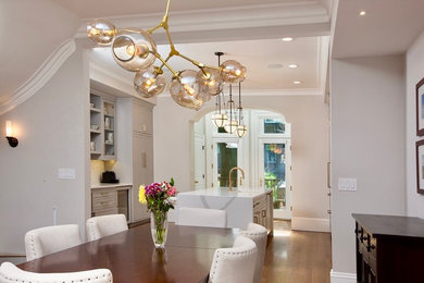 Kitchen/dining room combo - contemporary medium tone wood floor and tray ceiling kitchen/dining room combo idea in Boston with gray walls